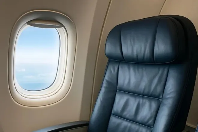 Windowless “Window Seats”: The Lawsuit Against Delta and United Airlines Exposes the Dark Side of Seat Fees 3 Image of a window seat on an airplane.